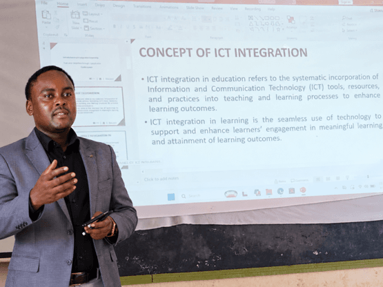  Douglas Omweba, Lead AT Instructor, presenting on ICT integration in CBE to teachers and County Education Quality Assurance Officers at St. Lucy’s School for the Blind, Meru.