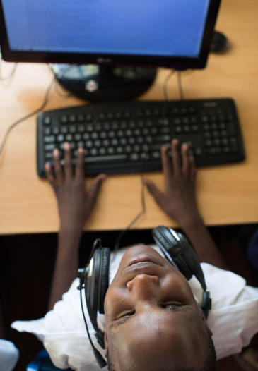 pupil using a desktop computer