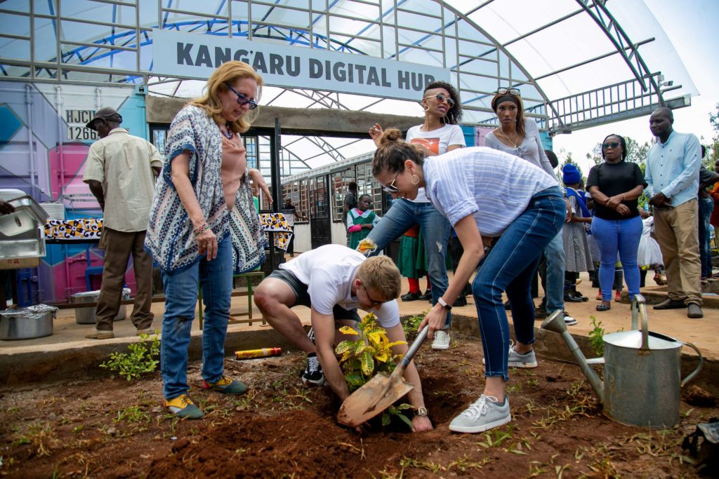 Laura, Sara and Alexander are planting a tree