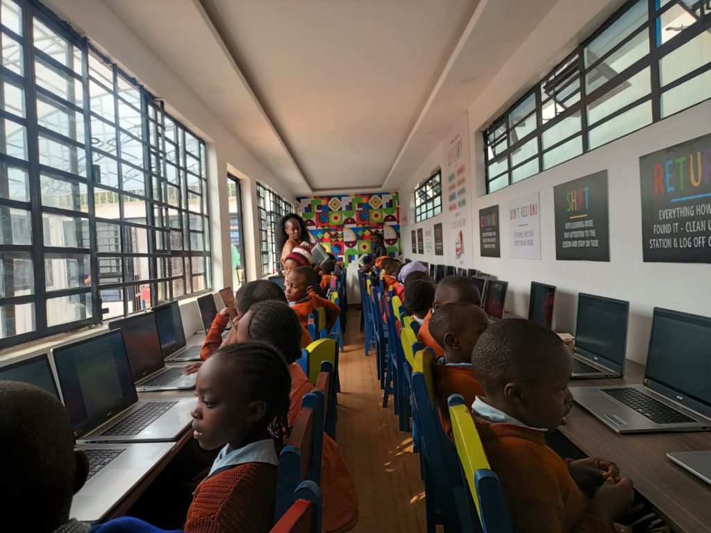 Photos of Primary School students during computer classes inside the new Kan’garu Digital Hub.